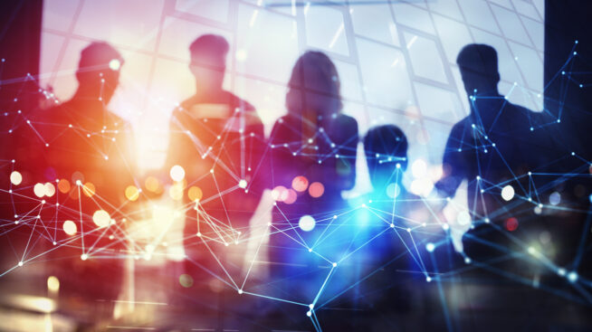 Silhouette of business people work together in office.